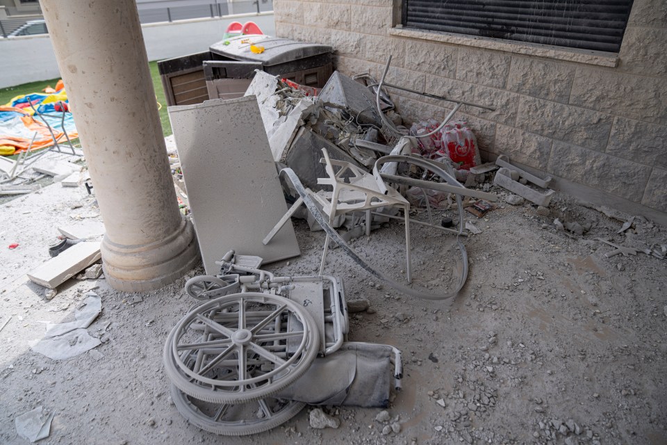 The damaged patio inside the Nidam family home