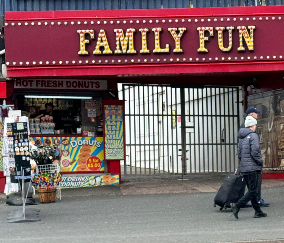 The woman had been queuing with children when she fell