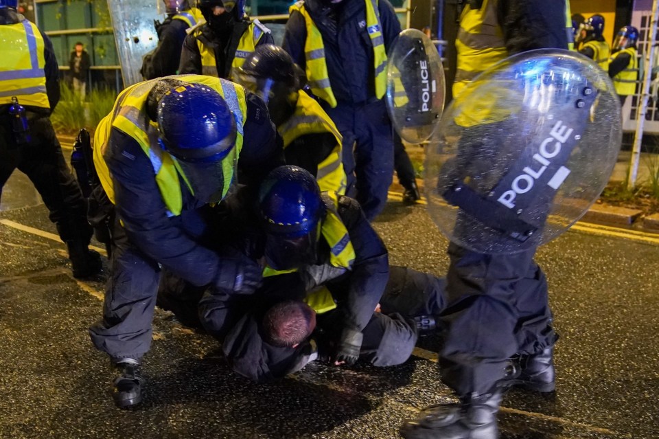 Riot police wrestled a protester to the ground in Sunderland last night