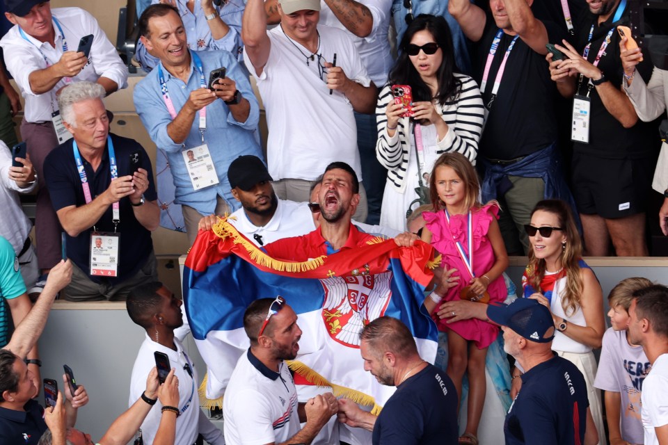 The Serbian superstar celebrates with his family