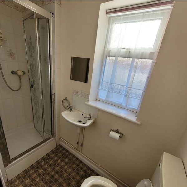 The bathroom before the big makeover was dull and outdated