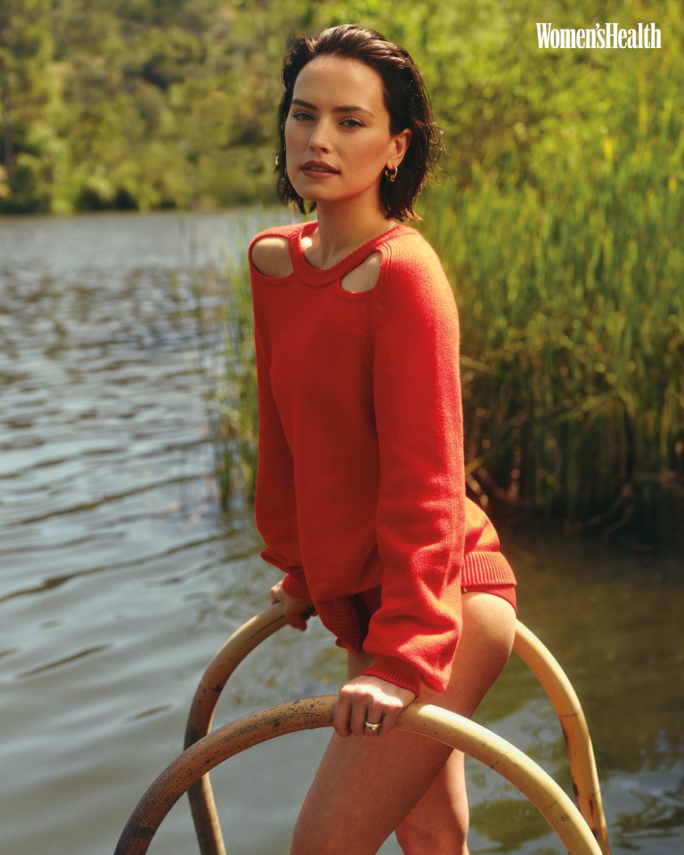 Daisy Ridley looked stunning as she posed in an orange jumper and bikini bottoms