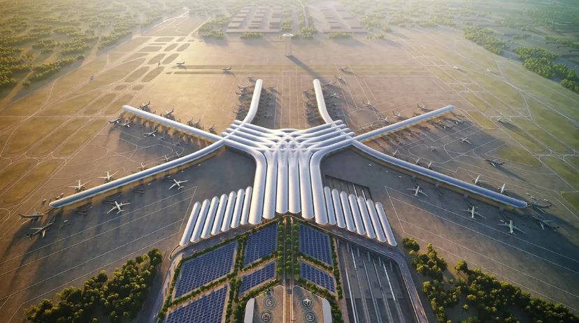 an aerial view of an airport with planes on the tarmac