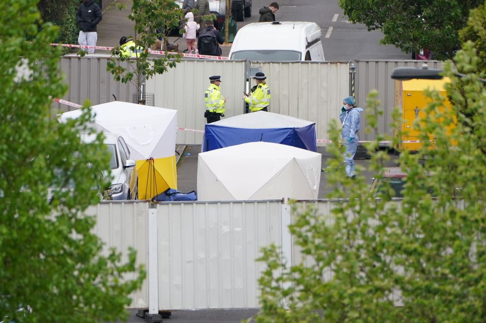 Police at the cordoned off house in Bermondsey after the attack