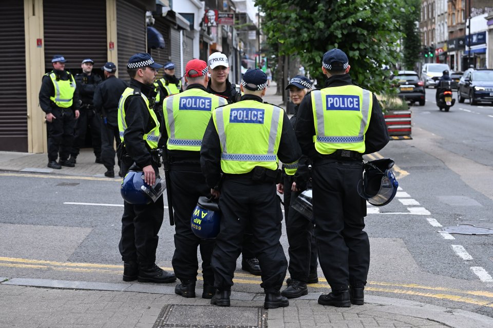 Police guard Immigration offices in North Finchley