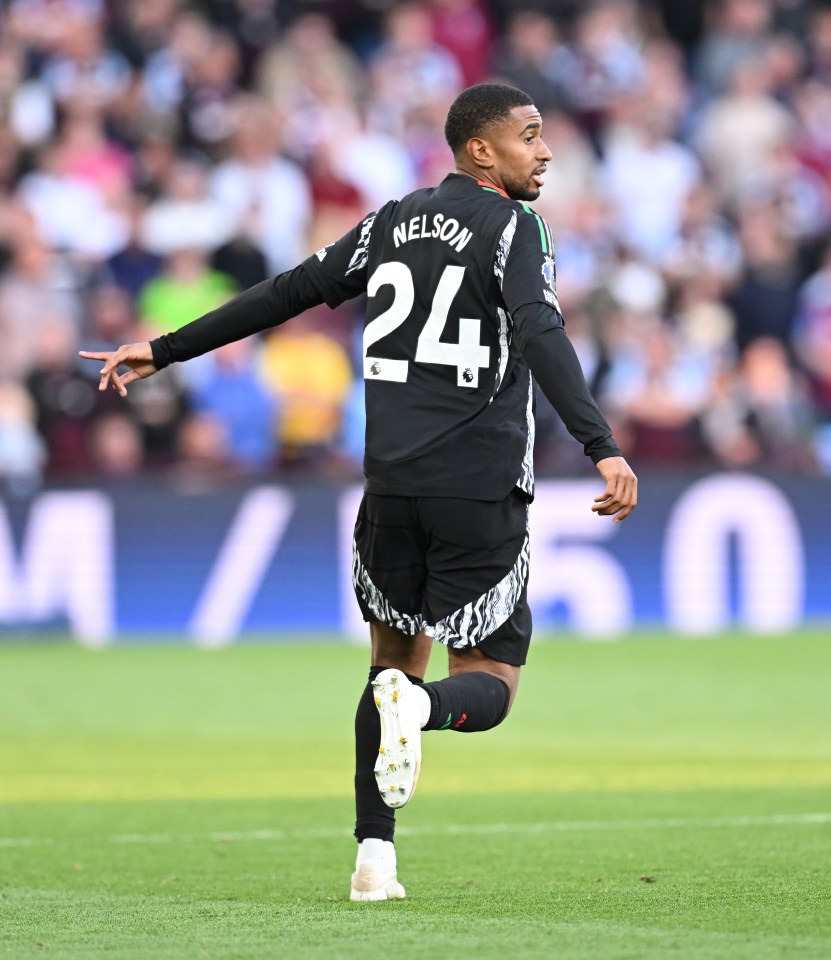 a soccer player with nelson on the back of his jersey