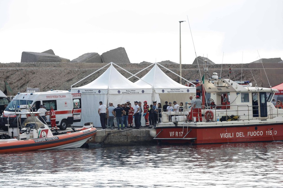 Rescue workers and an ambulance at Porticello Harbour after a body was brought ashore this morning