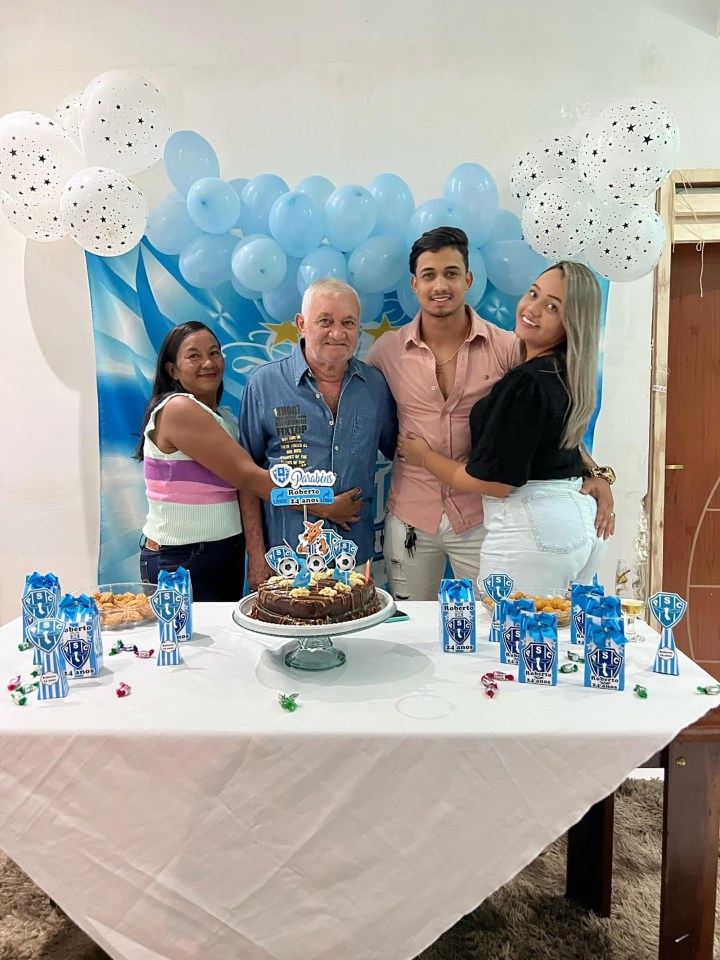 Roberto poses with his family on his birthday