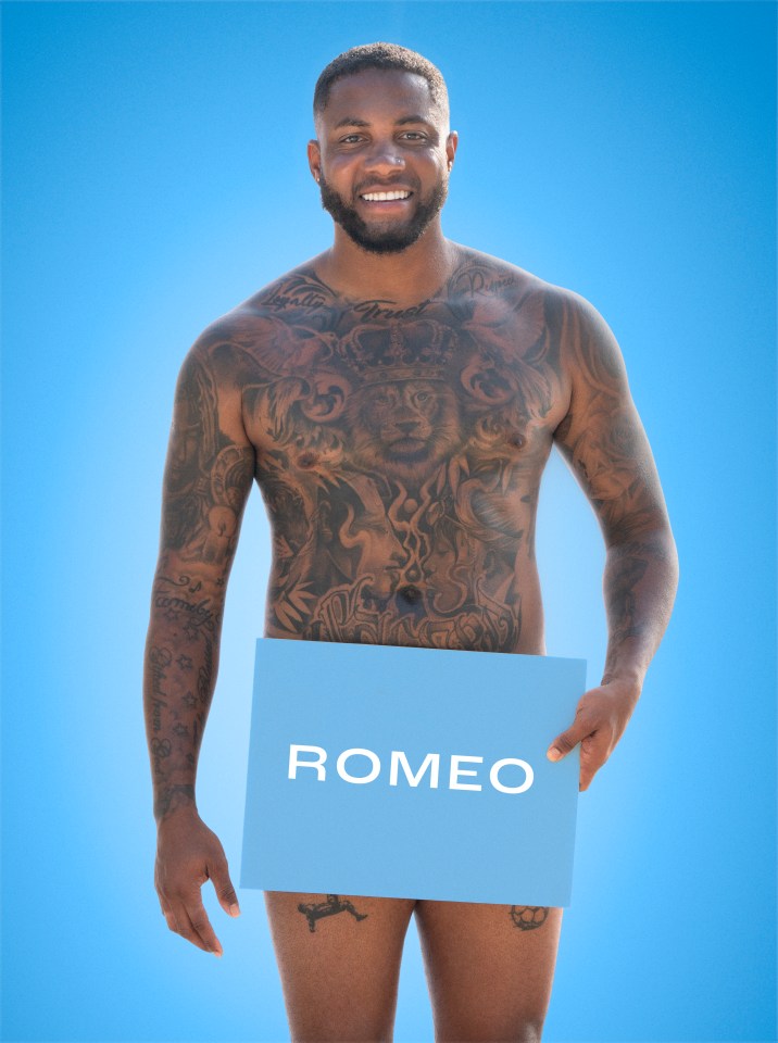 a shirtless man holding a sign that says romeo