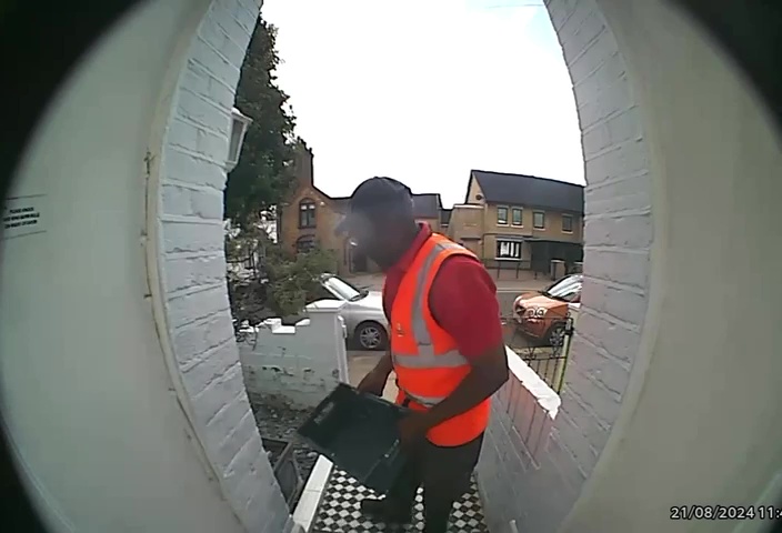 While Sylvan was out on Monday morning her doorbell camera caught the postman stuffing the first 633 envelopes through the door