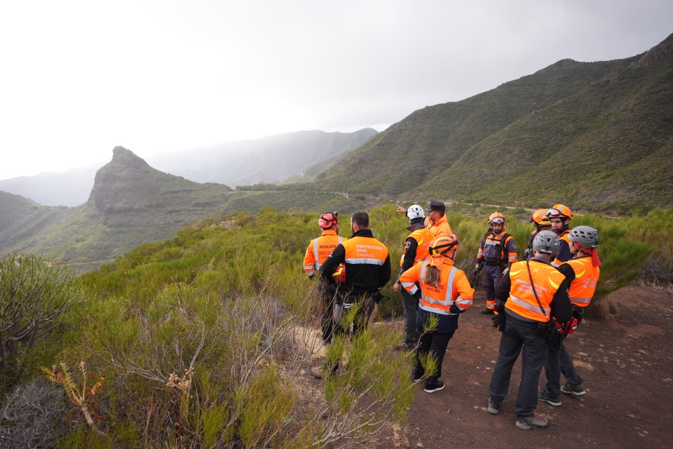 Search and rescue workers near the village of Masca on June 21