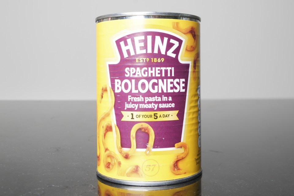 a yellow can of spaghetti bolognese from heinz