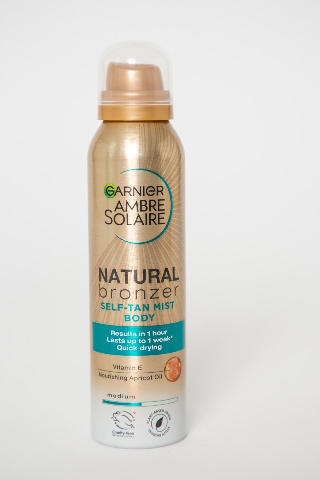 a bottle of garnier ambre solaire natural bronzer self tan mist