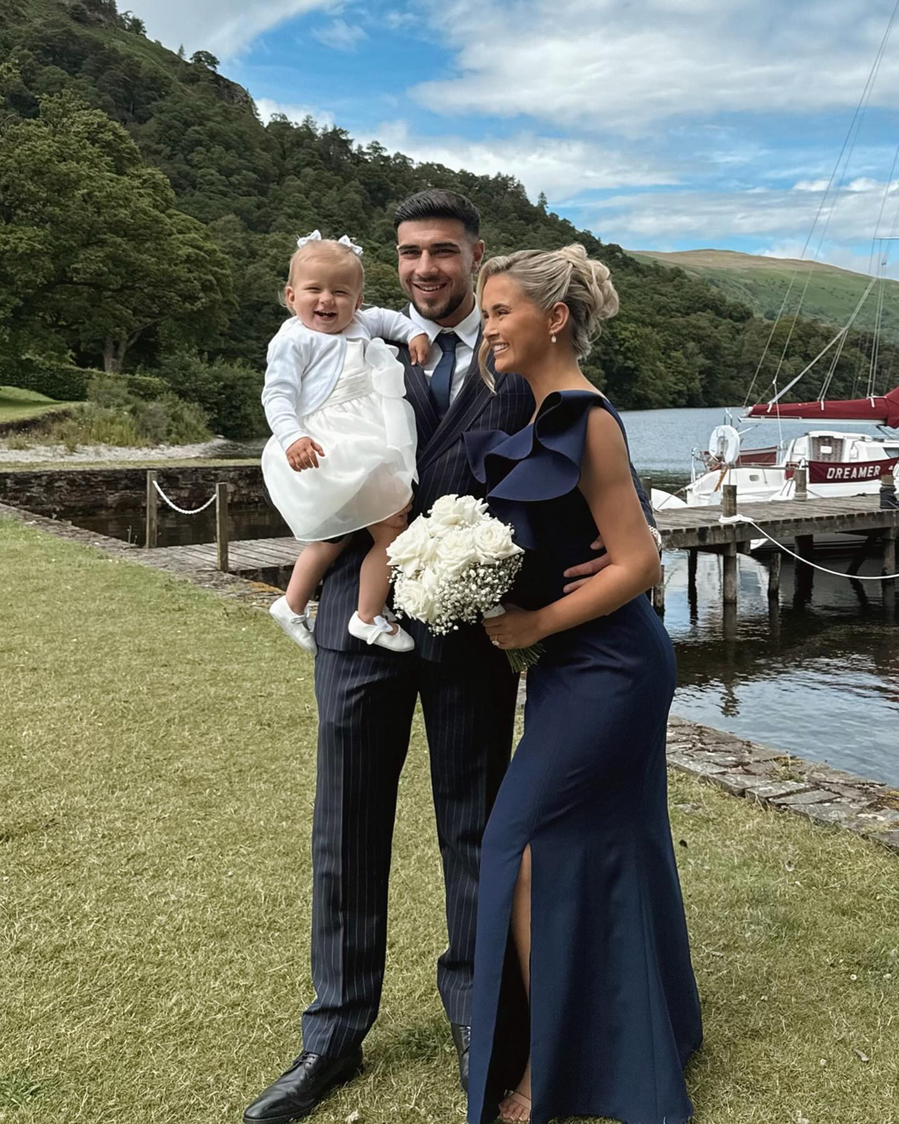 Molly-Mae with Tommy and their daughter Bambi at her sister's wedding in July