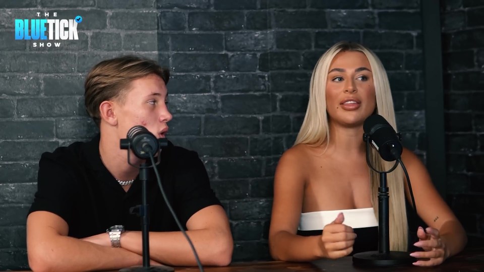 a man and a woman sit in front of microphones for the bluetick show