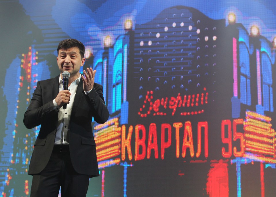 a man stands in front of a sign that says " квартал 95 "