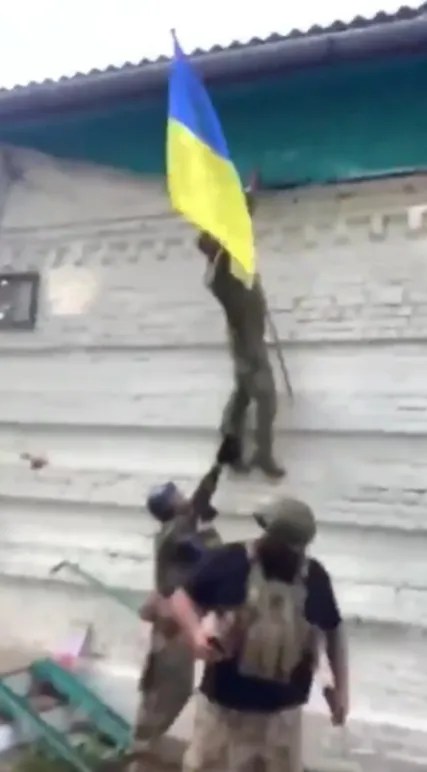 Ukraine's troops have been snapped hoisting their flag elsewhere in Kursk