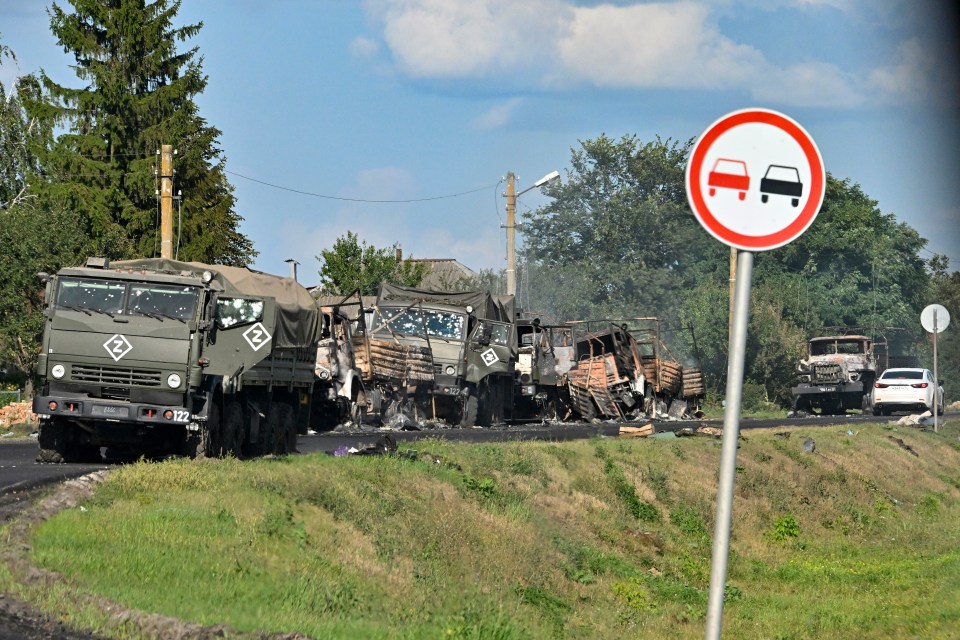 A column of Russian Army trucks were damaged by shelling on the highway