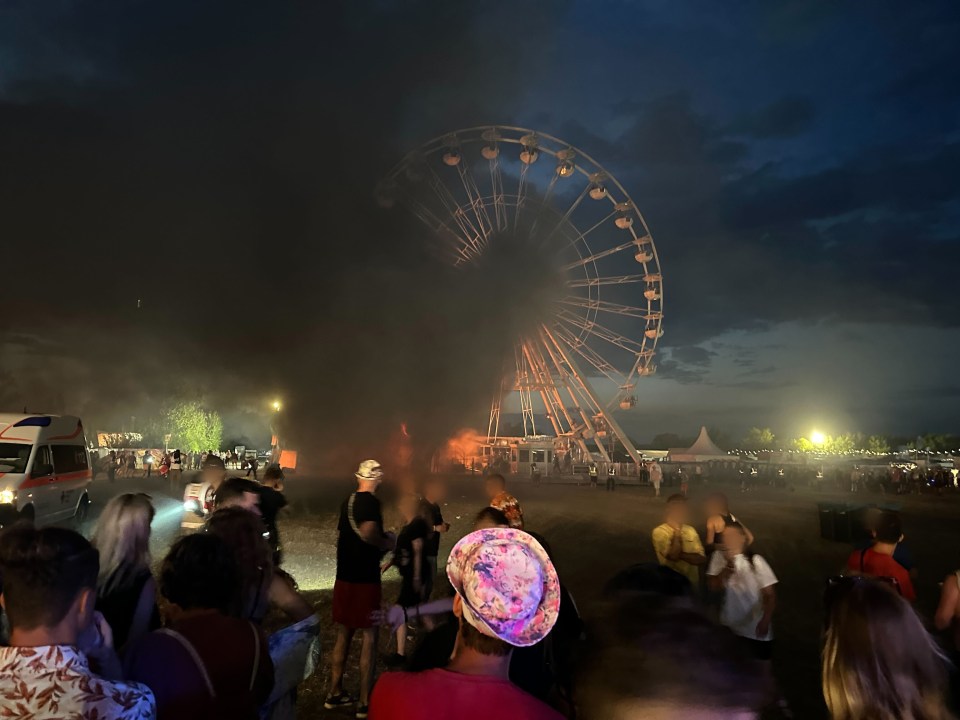 Clouds of smoke poured out from the ferris wheel at the festival