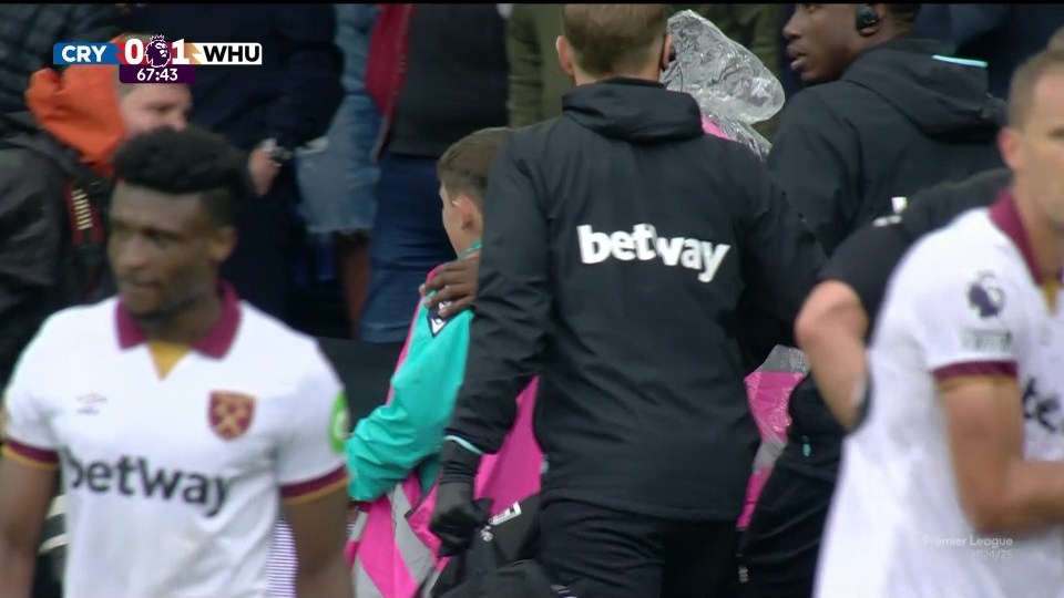 He was escorted away from the pitch following the scary incident