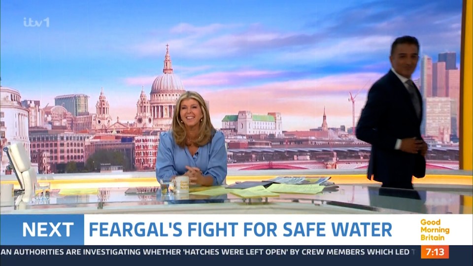 a woman sits at a desk in front of a screen that says next feargal 's fight for safe water