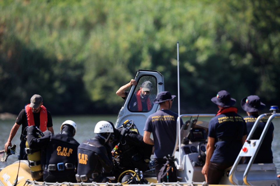 a group of gnr officers are on a boat