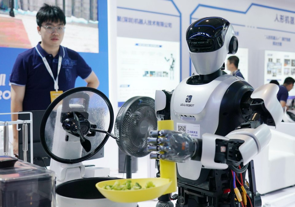 The robot gets busy in the kitchen as it prepares vegetables for human consumption