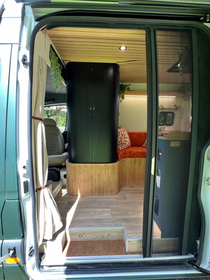 The view of the van from its sliding side door