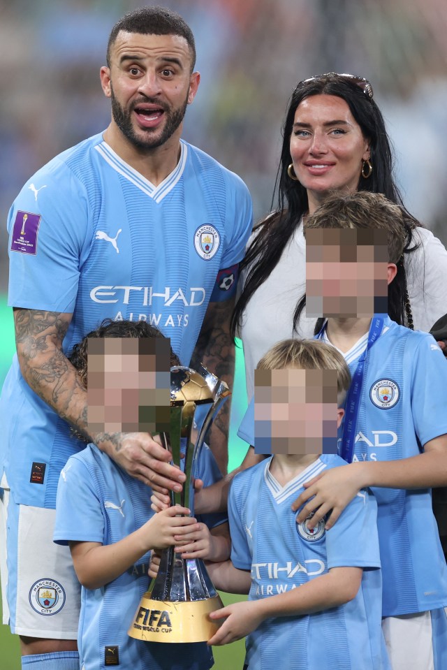 Love-rat Kyle Walker has moved back in with his estranged wife Annie Kilner - pictured, the star with his wife and three of their four kids