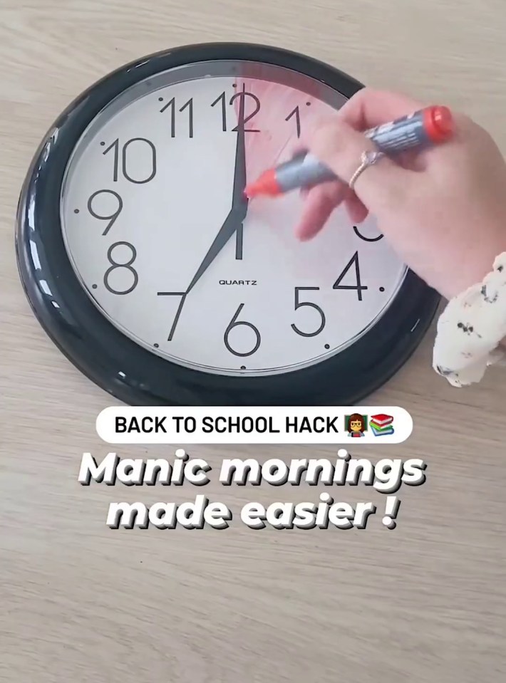 a person is writing on a clock that says " back to school hack "