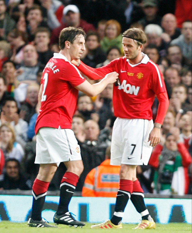 Gary and David Beckham playing alongside each other for Manchester United in 2011