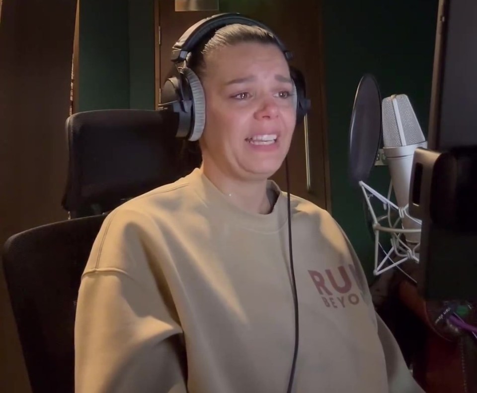 a woman wearing headphones is crying in front of a microphone with the caption " this book will make you cry "