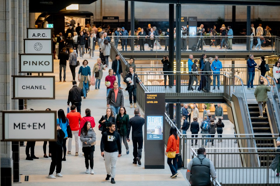 The building is now filled with shops and restaurants