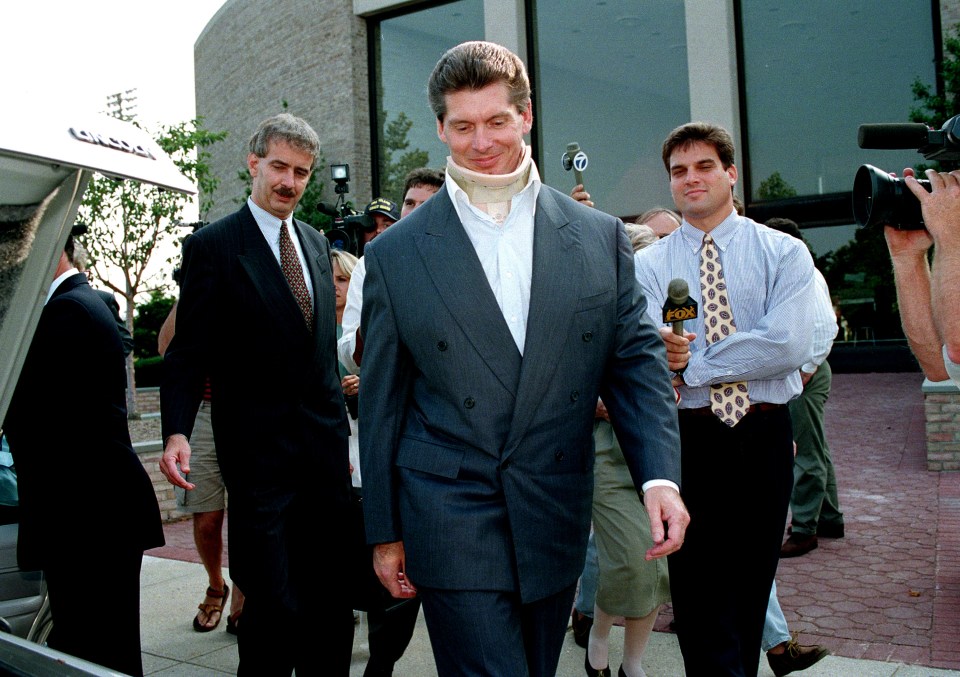 a man in a suit is being interviewed by cnn reporters