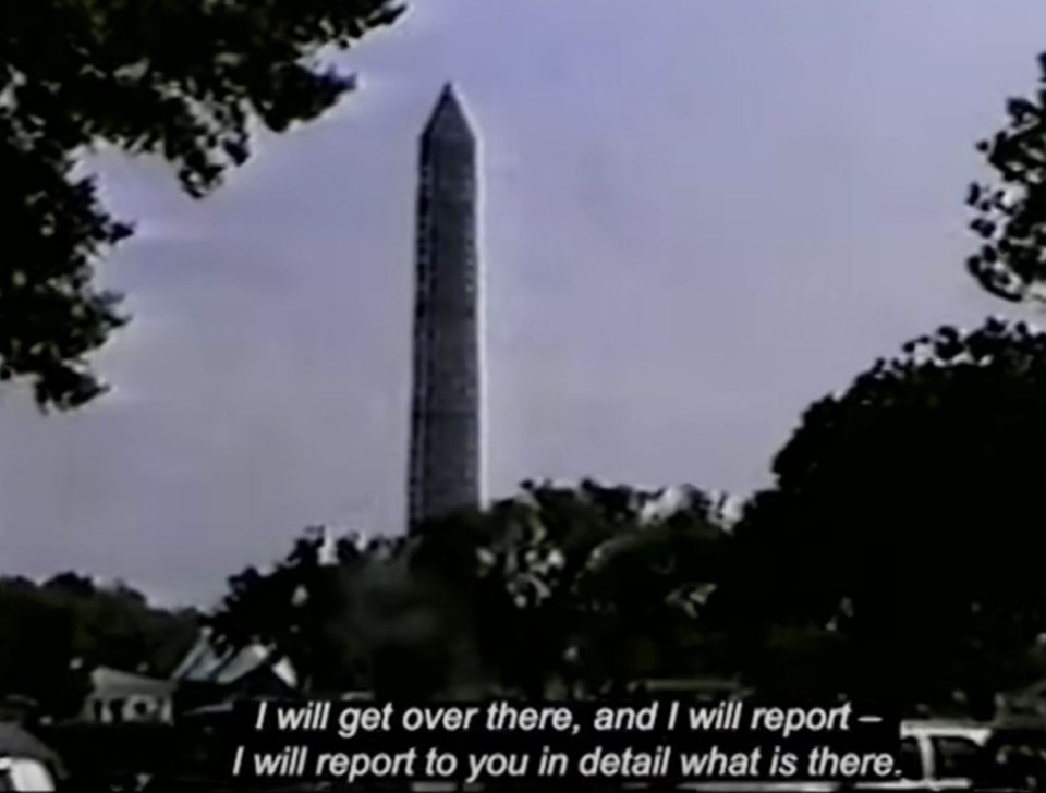 He pans the camera to the Washington Monument and promises to 'report back'