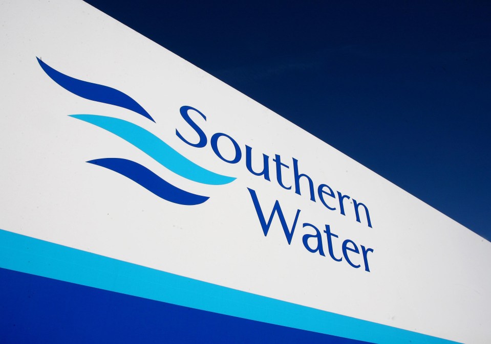 a blue and white sign for southern water