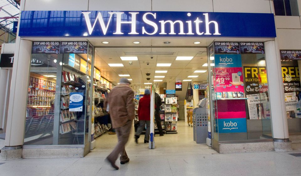 a store called whsmith has a sign that says stop and go go go