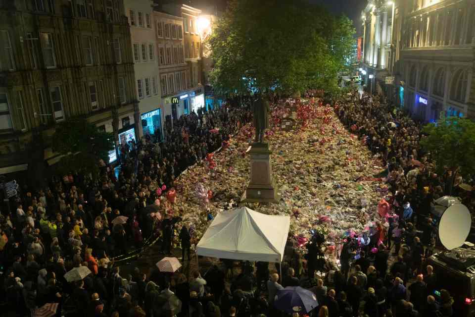 Martyn, 29, died with 21 others in the attack at an Ariana Grande gig in May 2017, pictured a vigil following the horror incident