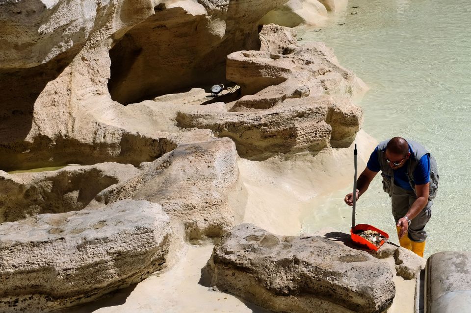 Workers collect the coins from the fountains twice every week