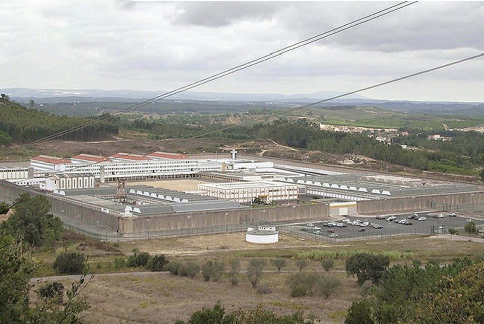 a large building with the word prison on it