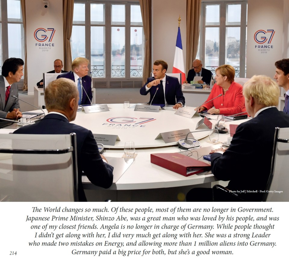 a group of people sitting around a table with a sign that says g7 france