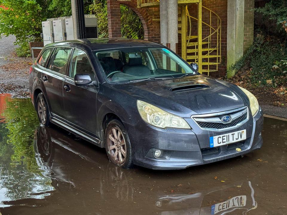 A vehicle stuck in floodwater in Godalming in Surrey