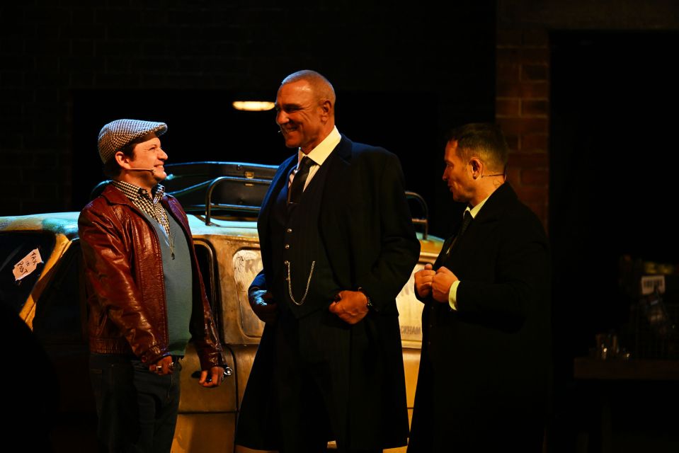 Football hardman Vinnie Jones looks cushty in a suit as Peckham hardnut Danny Driscoll, having a natter with wheelerdealer Del Boy, played by Sam Lupton