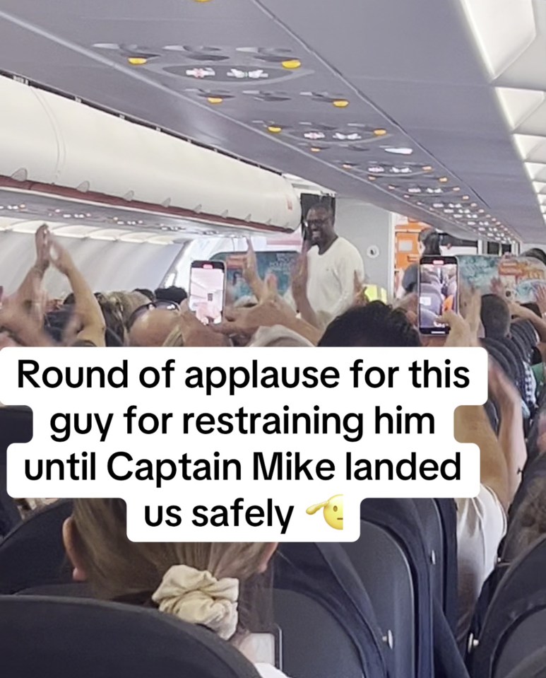 A hero passenger was given a round of applause for wrestling the drunk flier to the floor