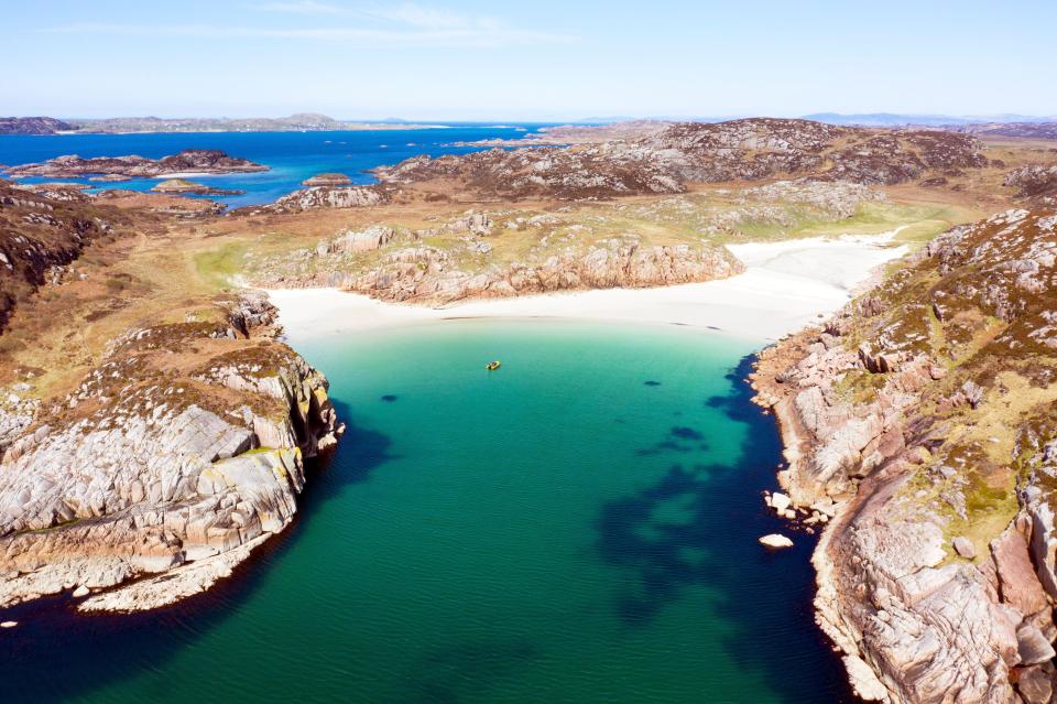 When the tide is low, the tiny isle is connected to the mainland by an expanse of sand