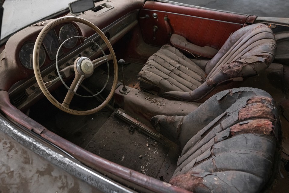 The original interior of the car was creme with the outside painted a bright red