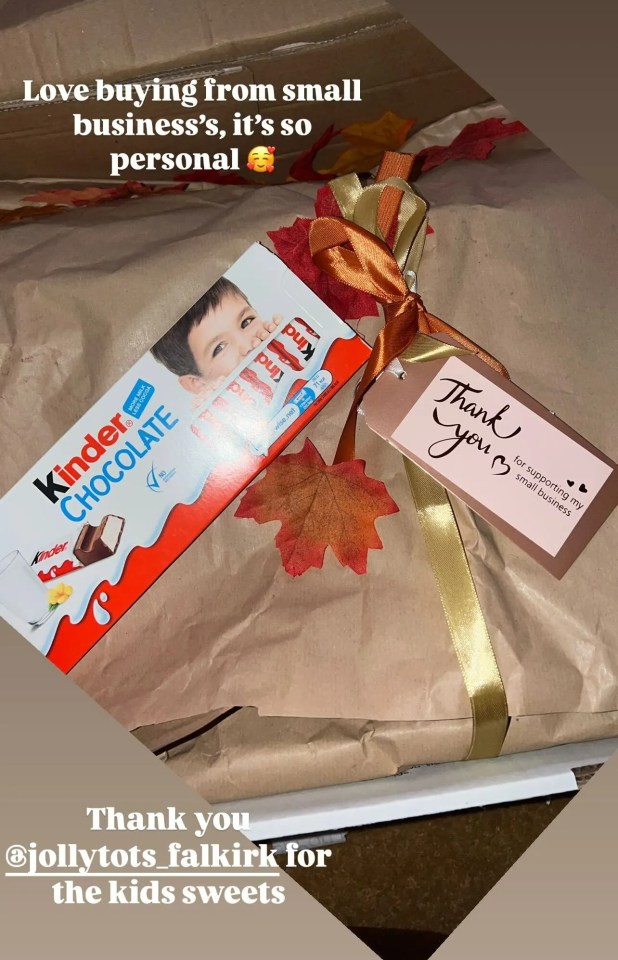 a kinder chocolate bar is wrapped in brown paper