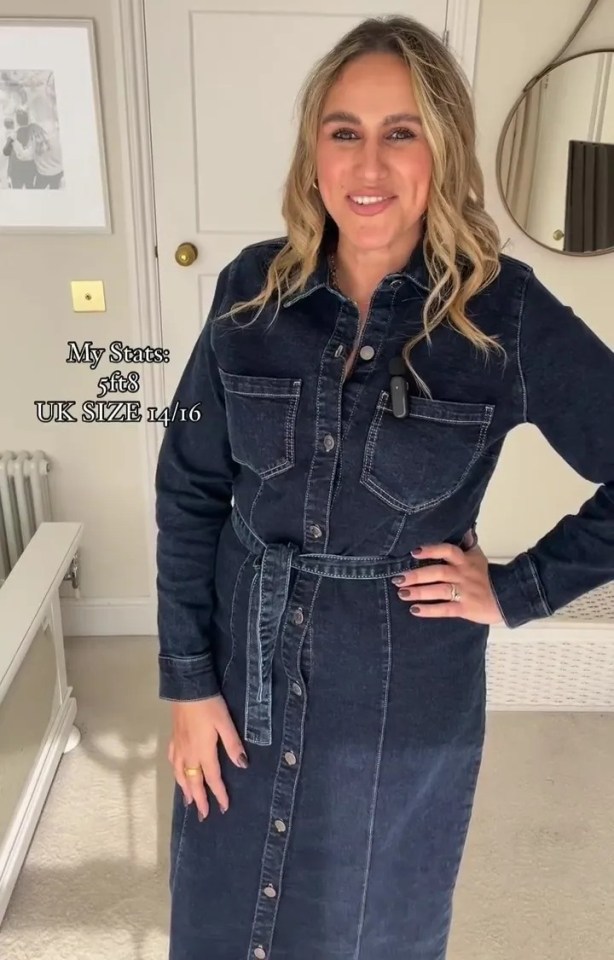 a woman is wearing a denim dress that is uk size 14/16