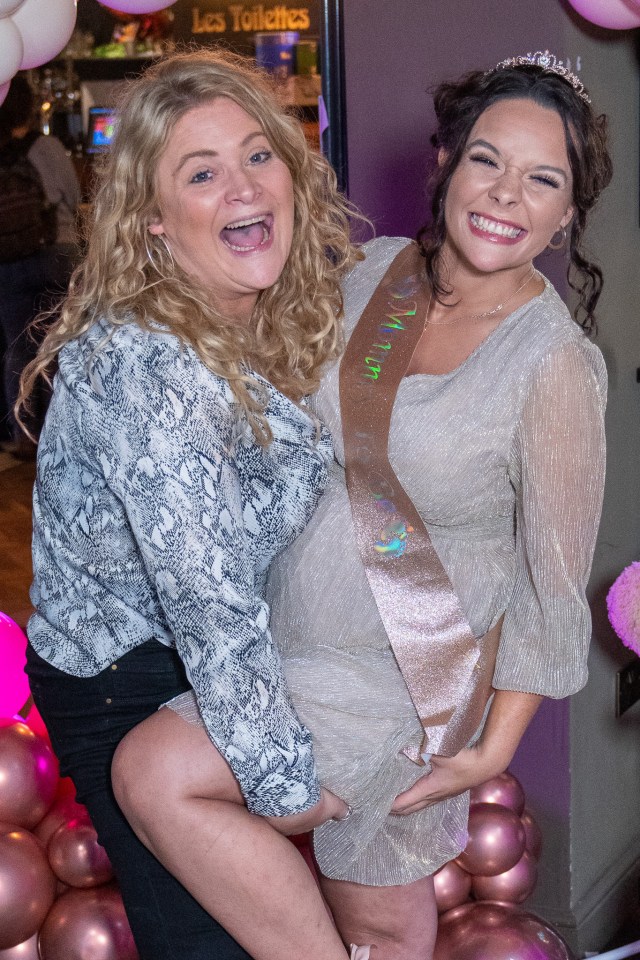 two women posing for a picture with one wearing a sash that says 30th birthday