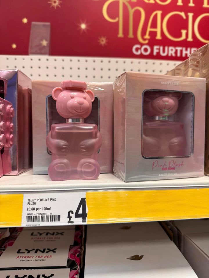 a bottle of teddy perfume pink plush sits on a shelf